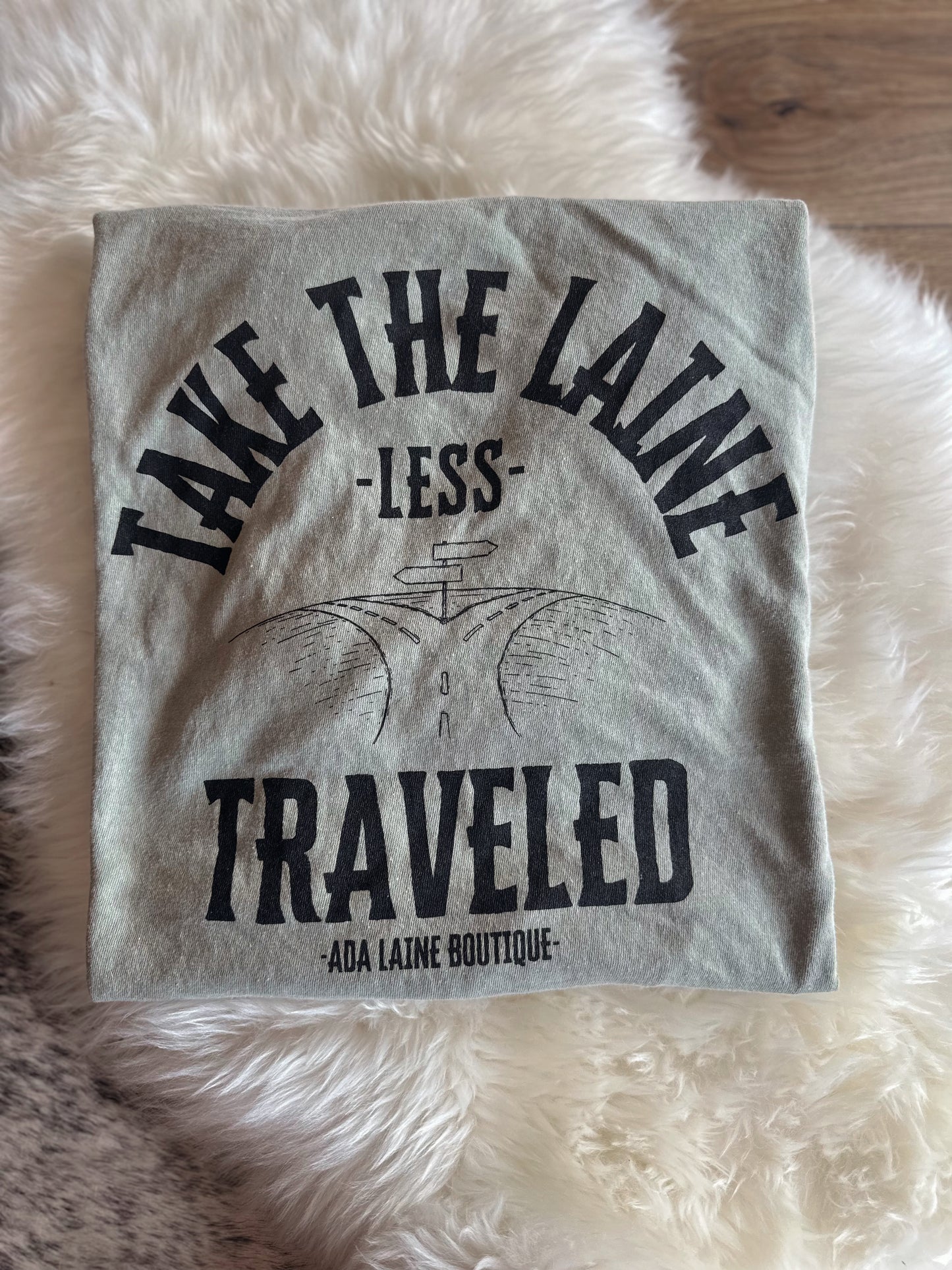 TAKE THE LAINE LESS TRAVELED | Graphic Tee